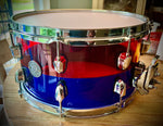 DrumPickers Custom Red & Blue Acrylic 13x7” Snare Drum with 30 Strand snare wires.