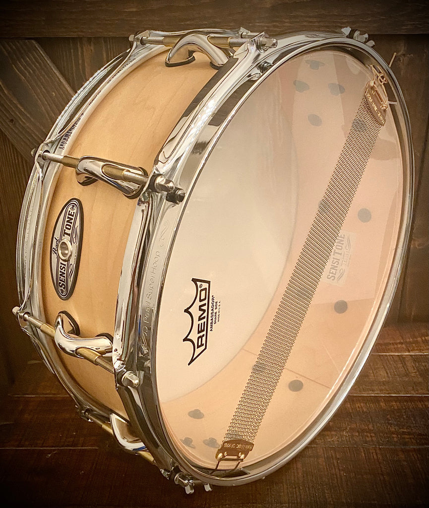 $265 Pearl Sensitone elite 14x5” brass snare drum. 10 lugs, superhoops,  nickel over brass shell. Sounds like a winning combination! Lot